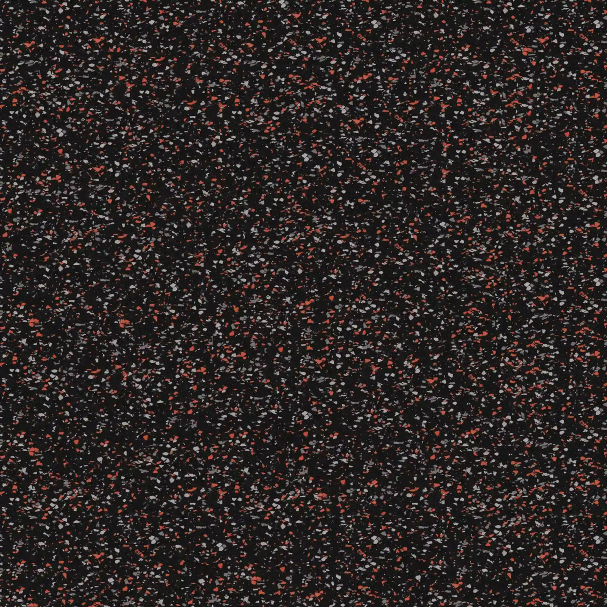 A close-up of ECORE Athletic’s Basic Fit Rubber Roll - 8mm Flooring shows a black rubber surface with red, white, and gray specks throughout, creating a unique speckled pattern.