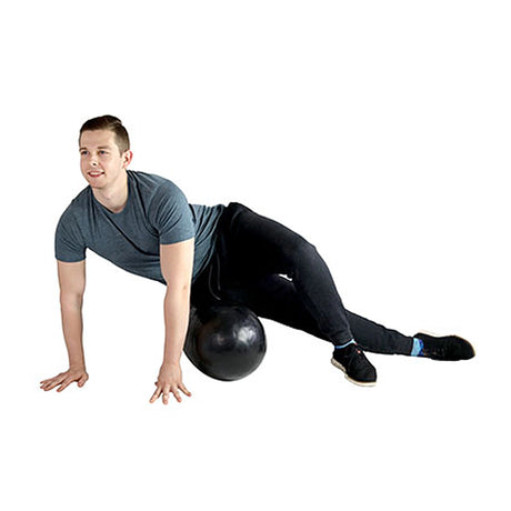 Man rolling hip on large inflatable PVC foam roller by CanDo