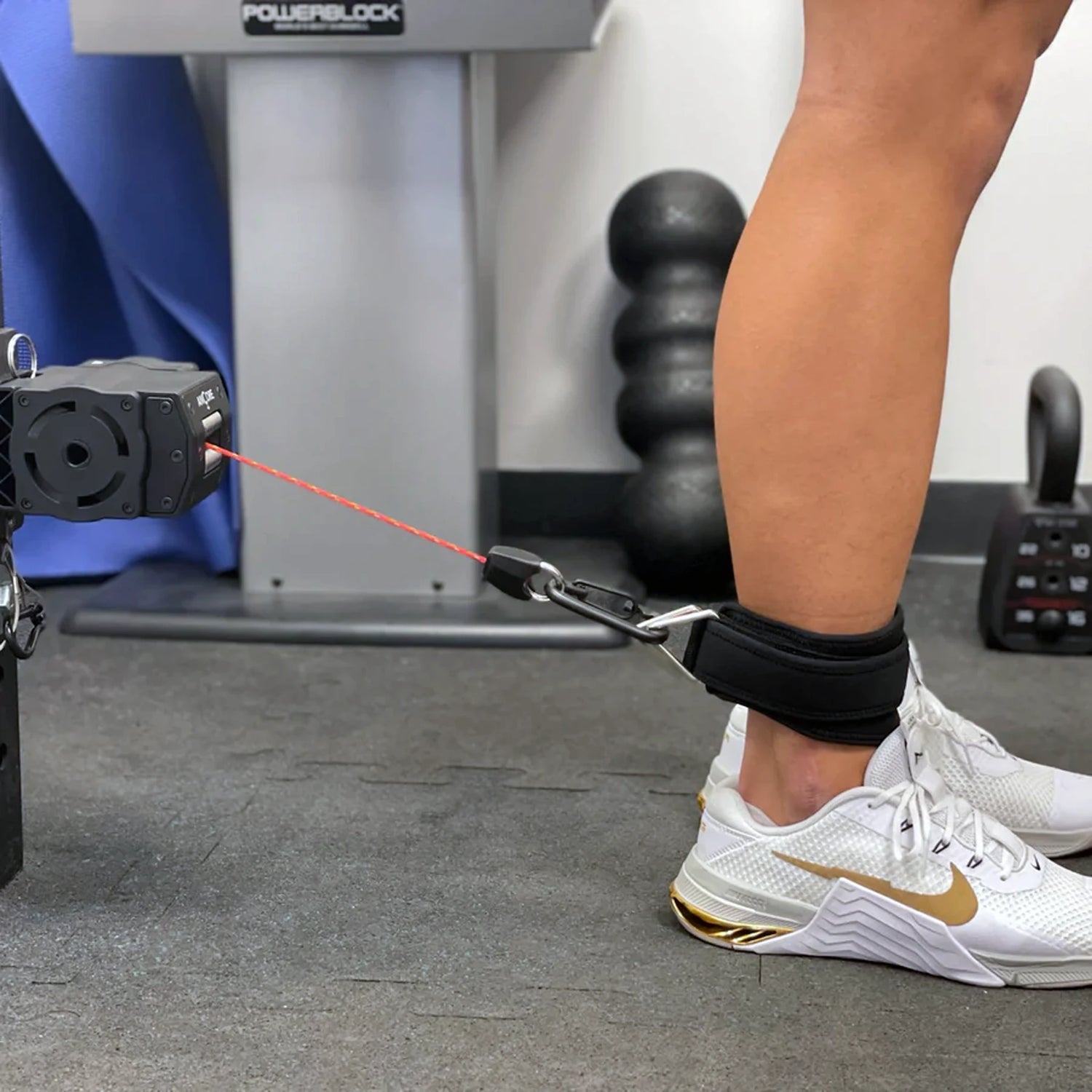 ANCORE adjustable portable cable column ankle strap attachment