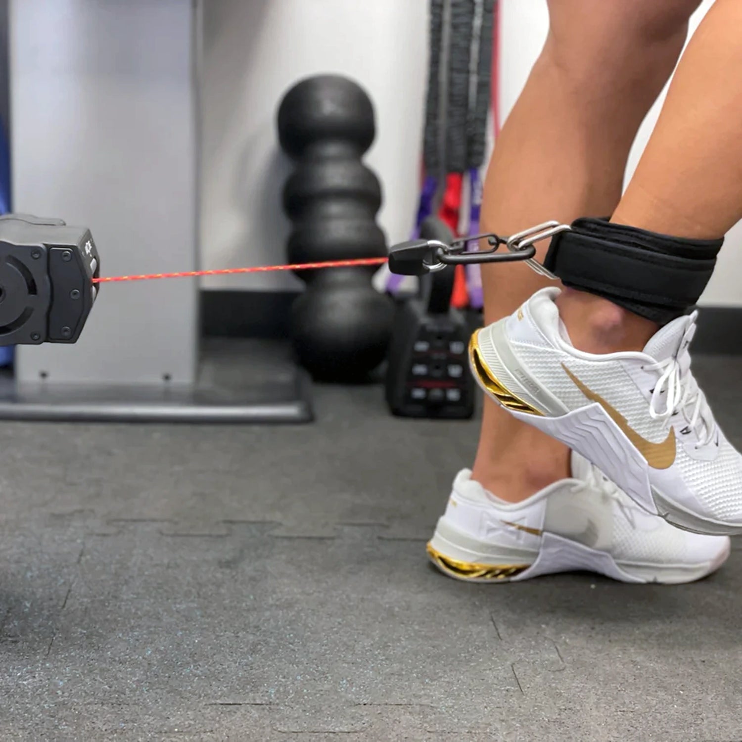 ANCORE adjustable portable cable column ankle strap attachment