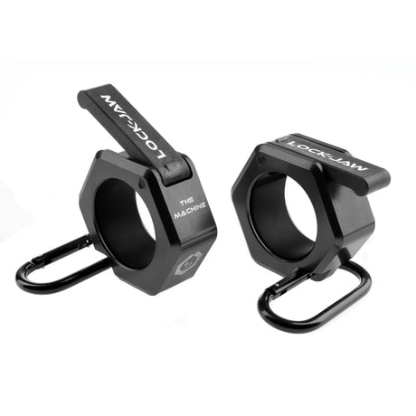 Black metal barbell collars by Lock-Jaw with the model name 'The Machine' written on the side in white letters