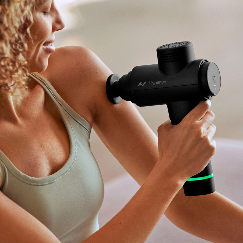 Percussion massage gun by Hyperice
