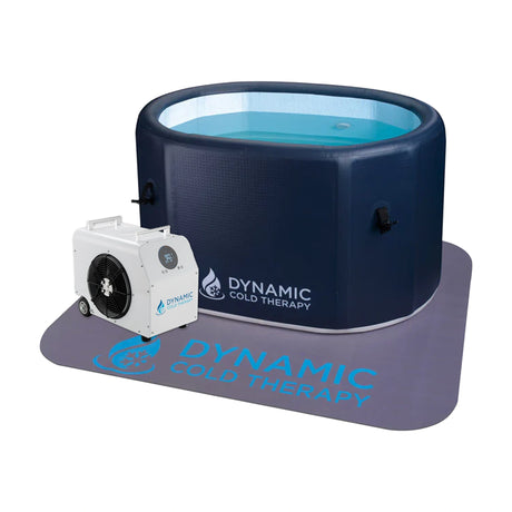 Dark blue inflatable cold plunge on a non-slip mat with a chiller next to it