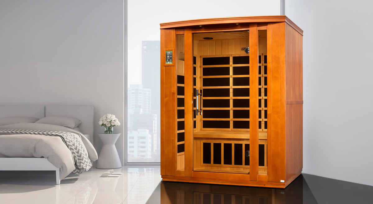 Dynamic Saunas Bellagio FAR Infrared Sauna in Canadian Hemlock, featuring nine carbon heating panels, Bluetooth music system, chromotherapy lighting, and spacious design for three people. Sleek tempered glass door with side windows and roof vent, easy setup, and 5-year warranty ensure a luxurious home sauna experience.