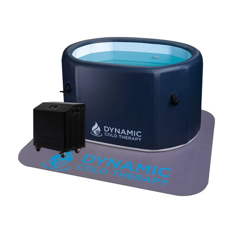 Dark blue inflatable cold plunge on a non-slip mat with a chiller next to it