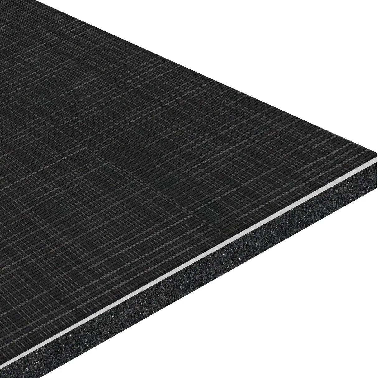 A close-up of the ECORE Ebb & Flow Motivate Laminate Roll - 6mm Class 1 Flooring by ECORE Athletic shows its dark, rectangular board with a textured grid surface and visible layered core at the edge.