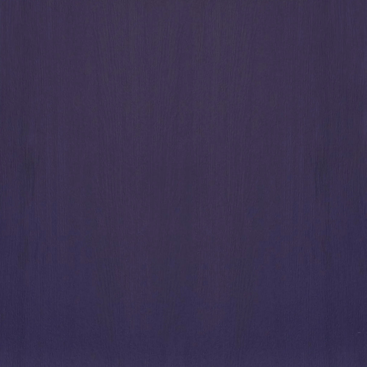 The ECORE Moxie Motivate Laminate Roll by ECORE Athletic features a dark purple, subtly textured surface reminiscent of painted wood or a matte finish, and comes in 10.5mm Class 1 flooring.