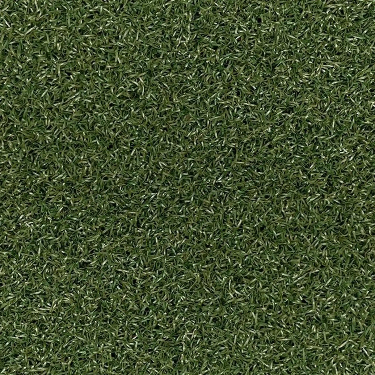 A close-up of ECORE Athletic’s RageTurf UltraTile - 1" Athletic Turf Tile highlights dense, varied green blades for a natural, textured look—ideal for athletic surfaces.