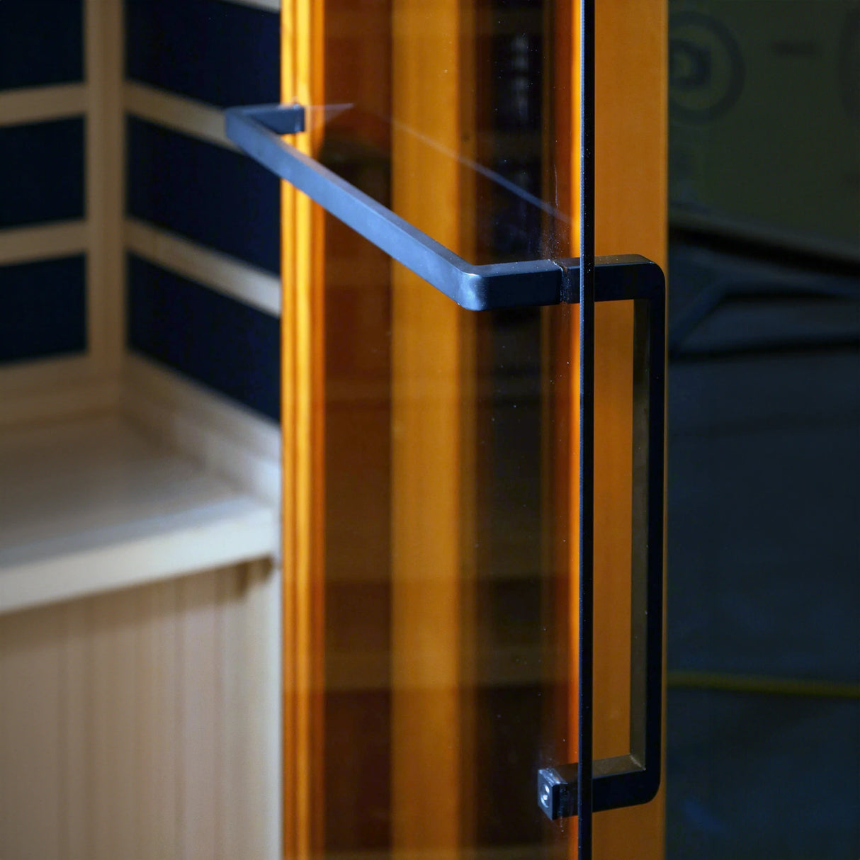 Front door on the Golden Designs 2025 Reserve Edition full spectrum infrared corner model sauna with a 4 person capacity and built in himalayan salt bar