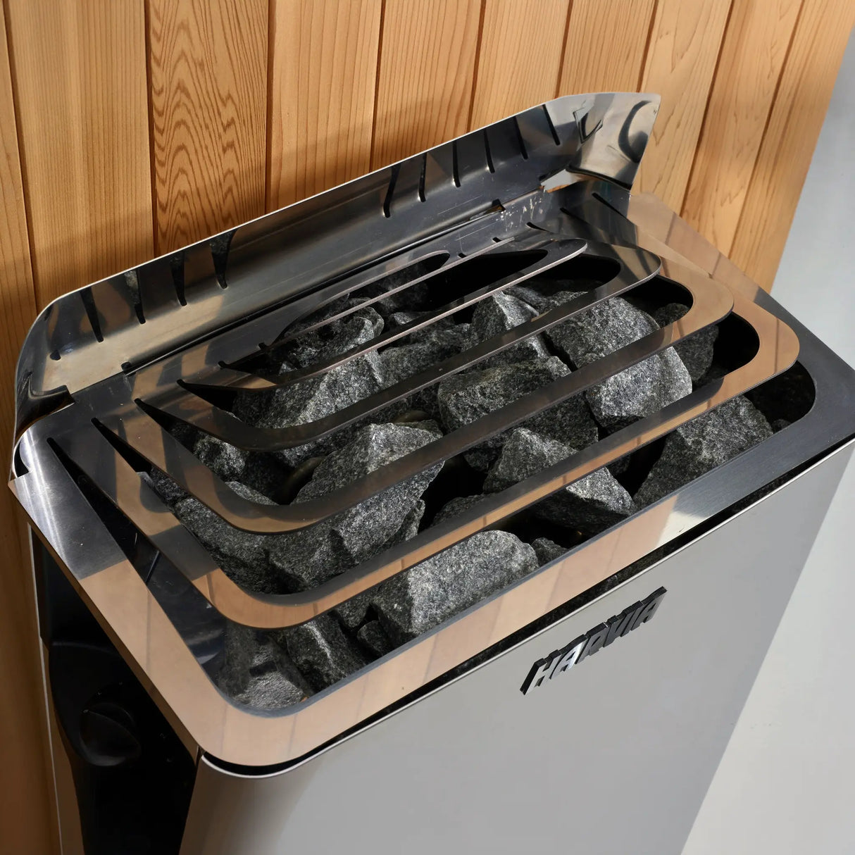 Traditional steam Harvia brand wall-mounted sauna stoveTraditional steam sauna Harvia brand wall-mounted stove