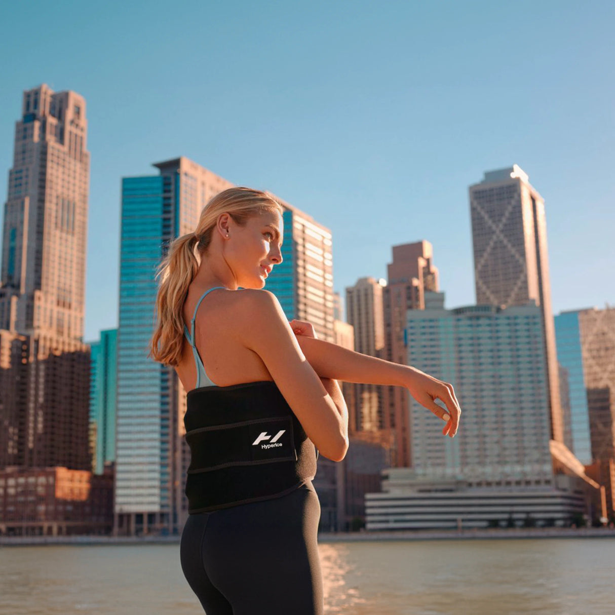 Pad which wraps around your back to provide heat and vibration therapy to increase circulation and decrease pain