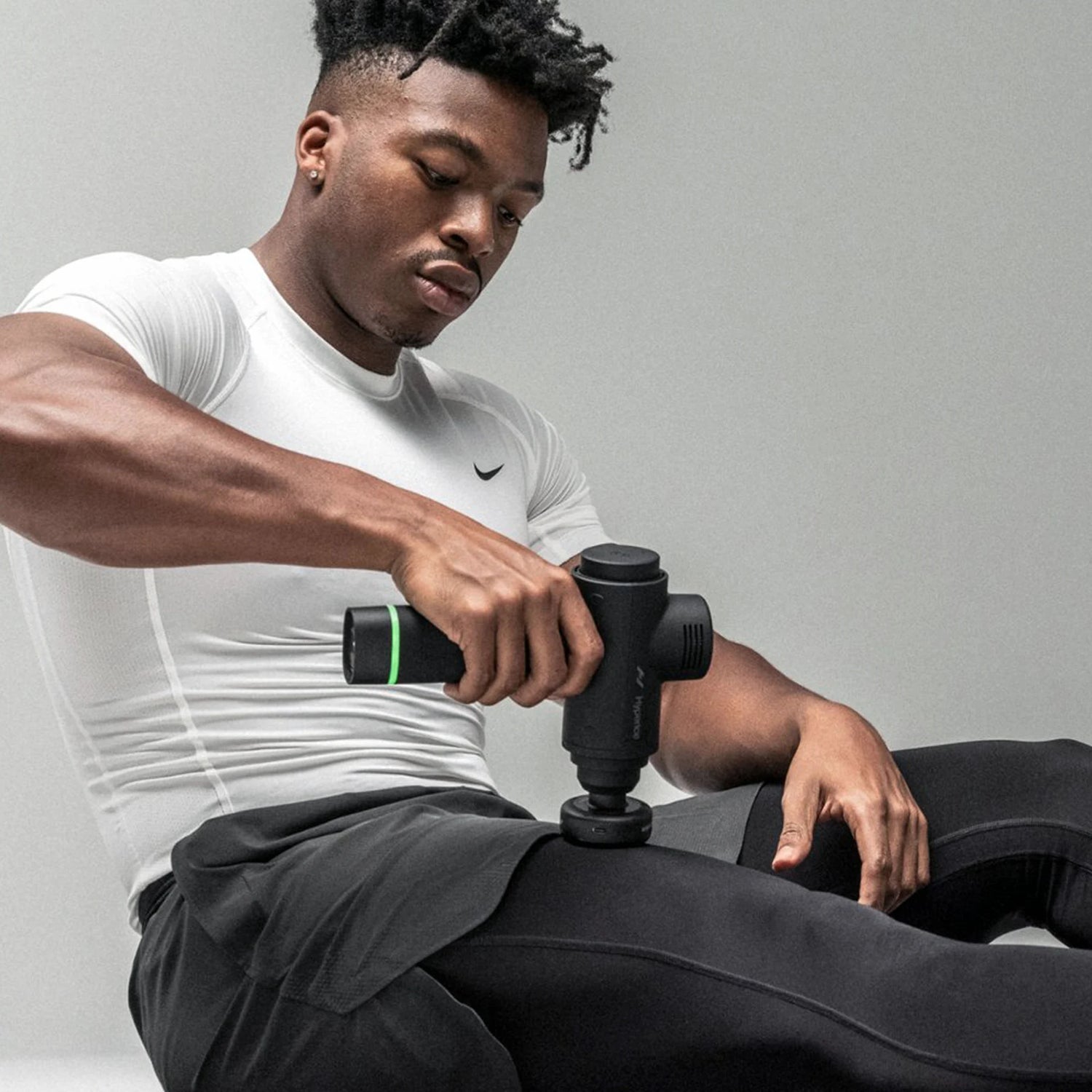 Percussion massage gun heated head attachment made by Hyperice for Hypervolt brand massage guns