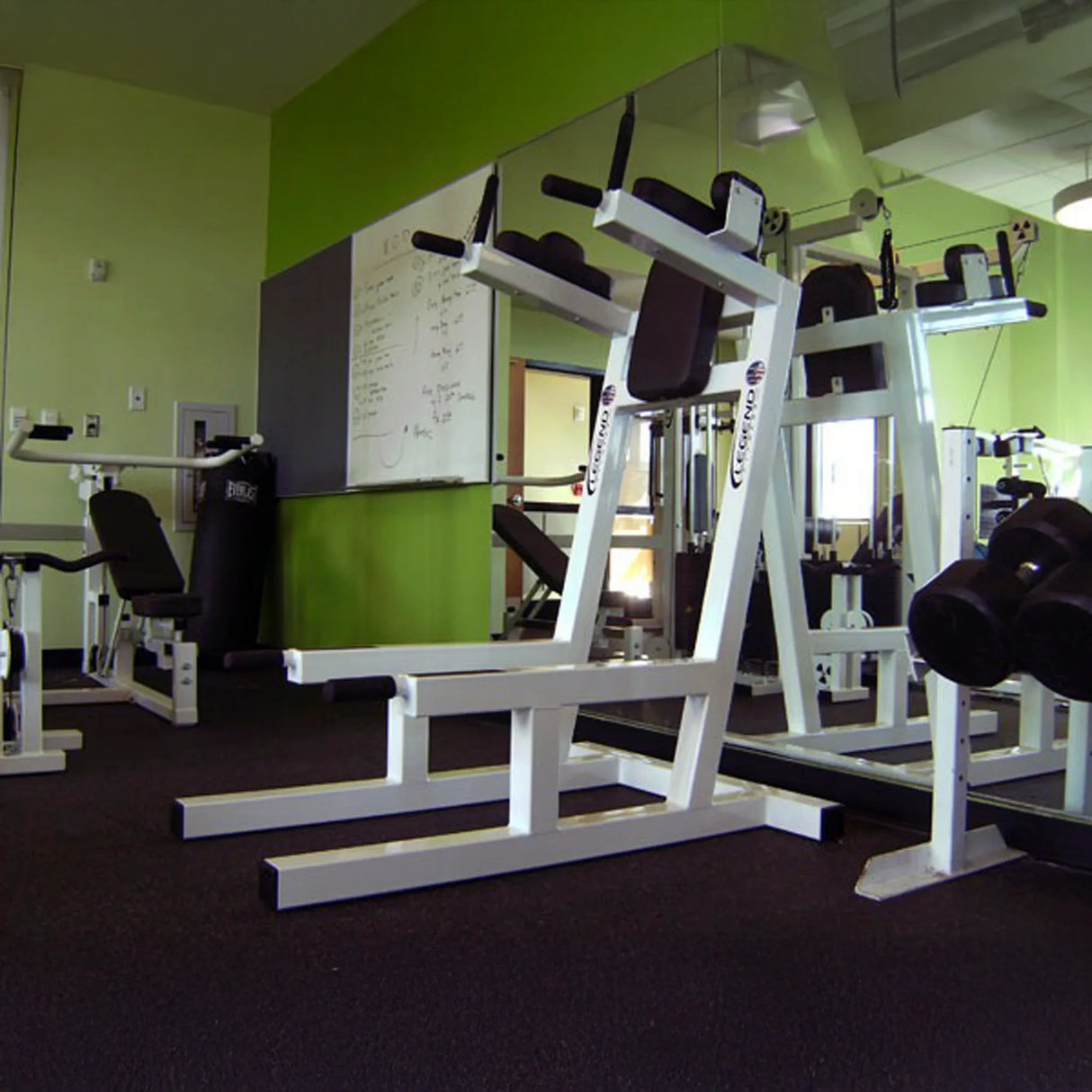 A white metal crunch chair with black upholstery on a white background