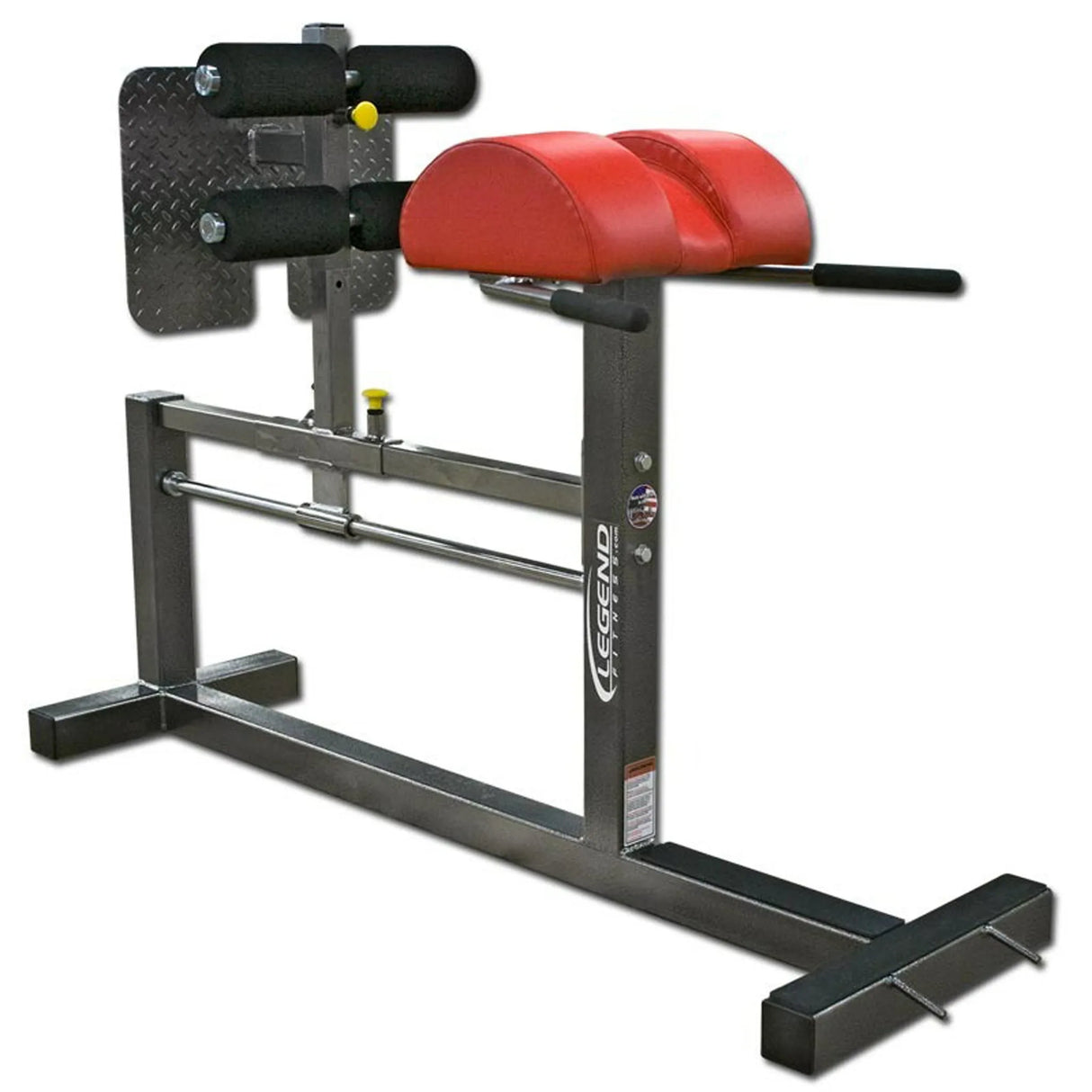 A red and gray glute ham developer fitness machine on a white background