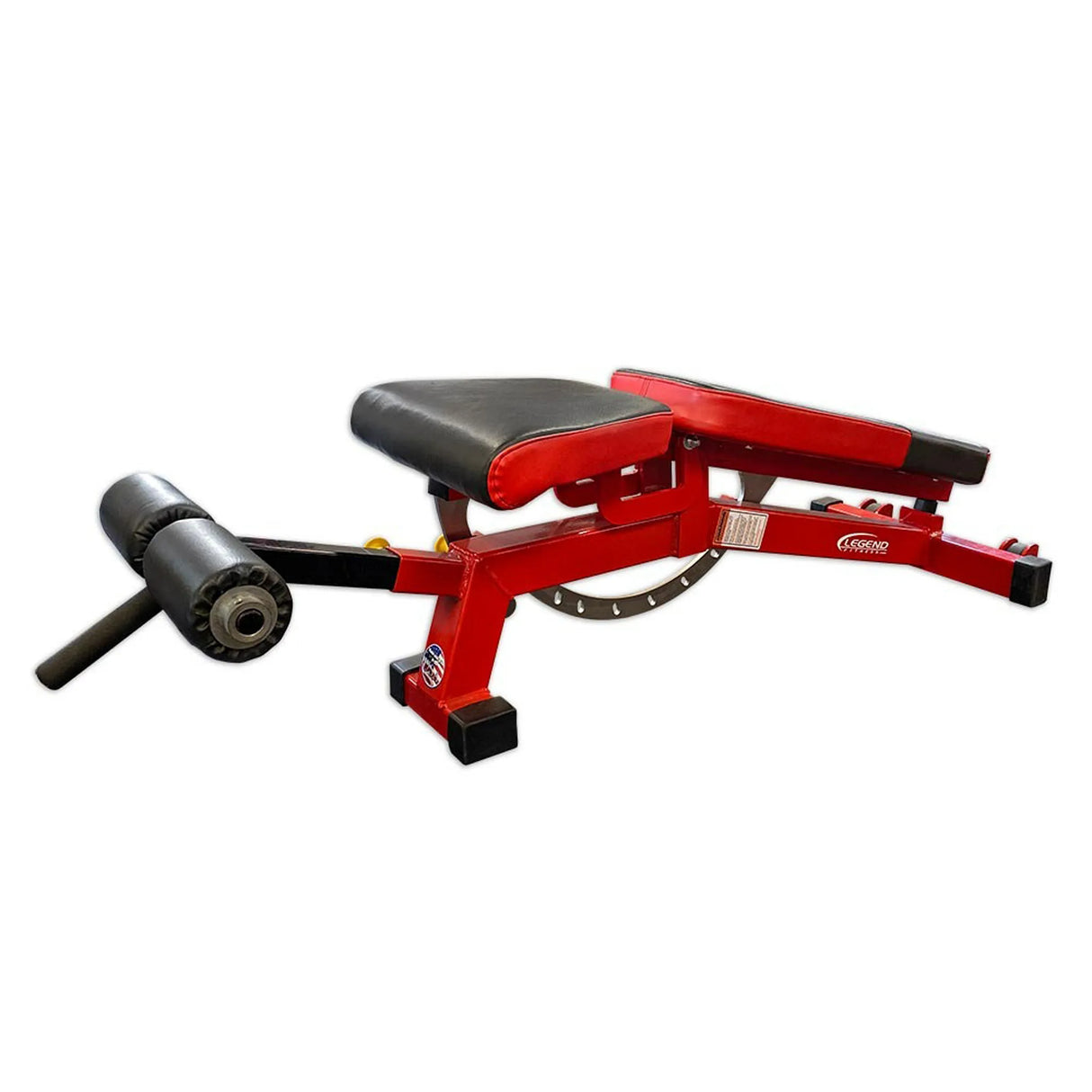 Red weight bench with black seat and leg roller attachment on a white background