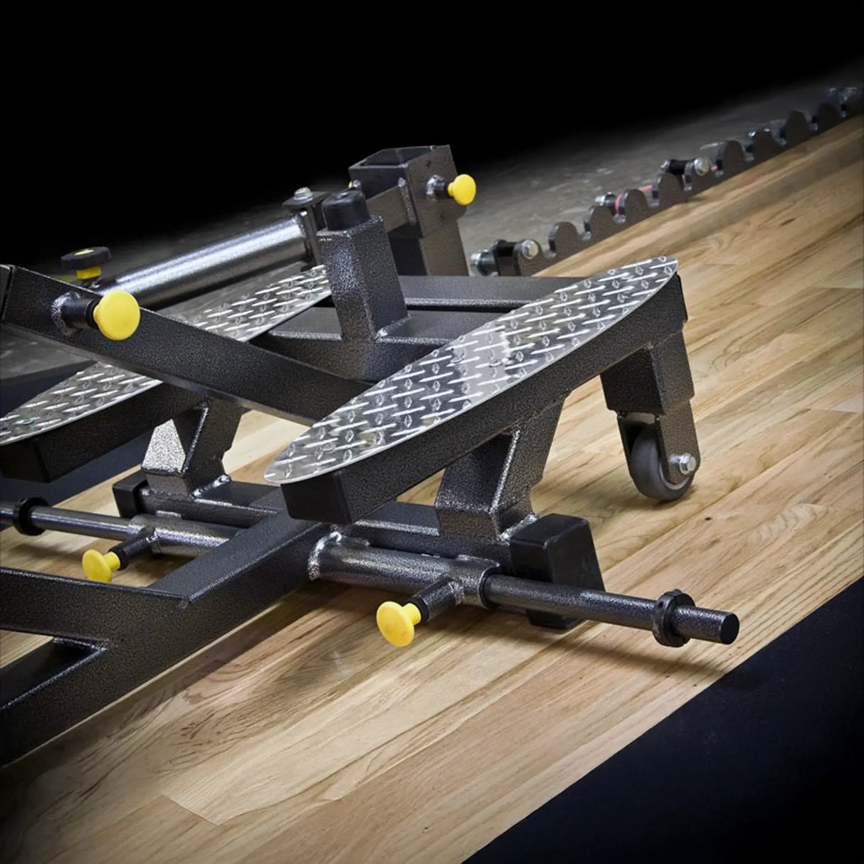 Closeup of a metal bench press with a metal standing platform