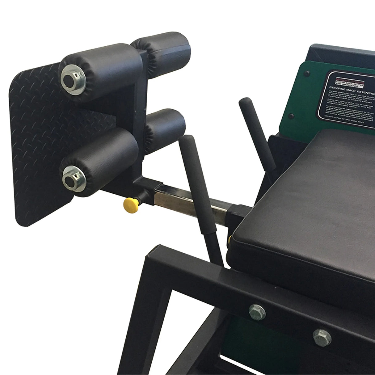 Close-up of the Legend Fitness 976-GH Reverse Back Extension/GHD Combo Machine, featuring padded rollers, a textured footplate, adjustment handles, and a cushioned bench by Legend Fitness against a plain white background.