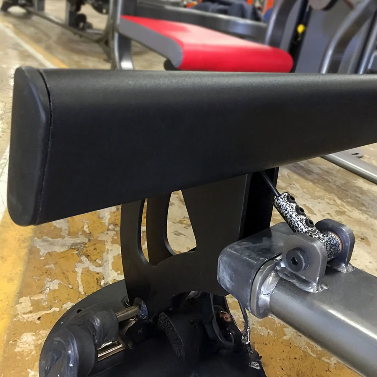 Closeup of a black and gray gym machine