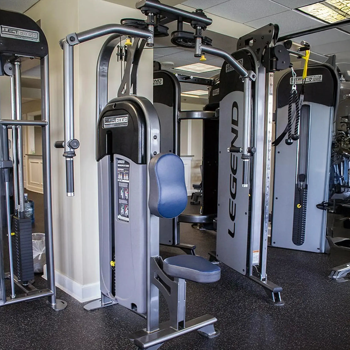 Gym equipment with 'Legend' branding in a fitness center setting