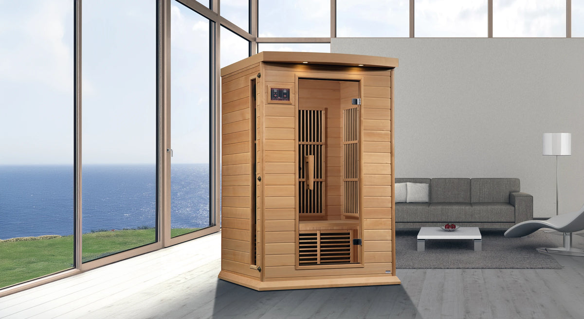 Two person hemlock sauna in living room overlooking ocean