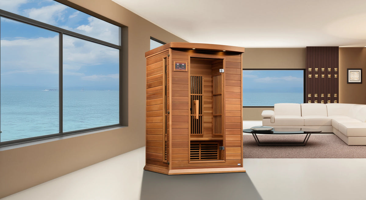 Infrared red cedar sauna inside a living room which overlooks the ocean