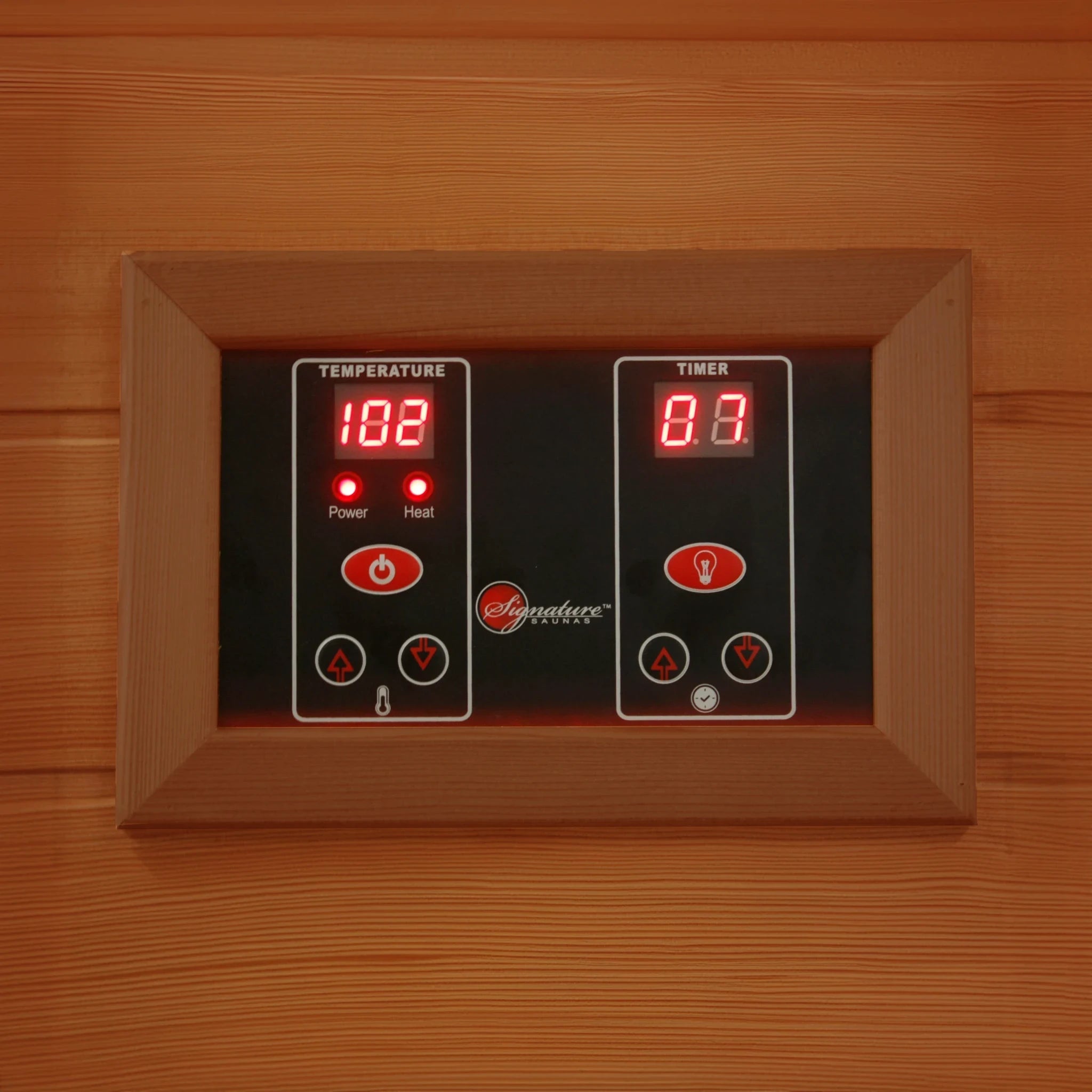 Black and red LED control panel inside a Canadian red cedar sauna