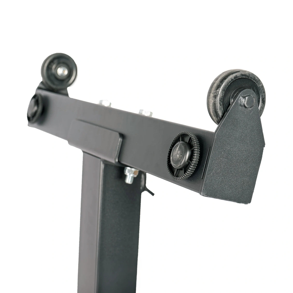 A closeup image of the transport wheels on a black PowerBlock utility bench