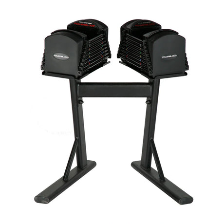 A PowerBlock PowerStand with dumbbells on it