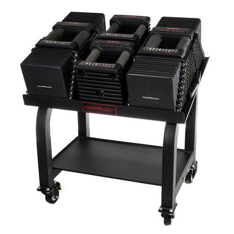 A PowerBlock Commercial Pro Max Stand with dumbbells and handles on it