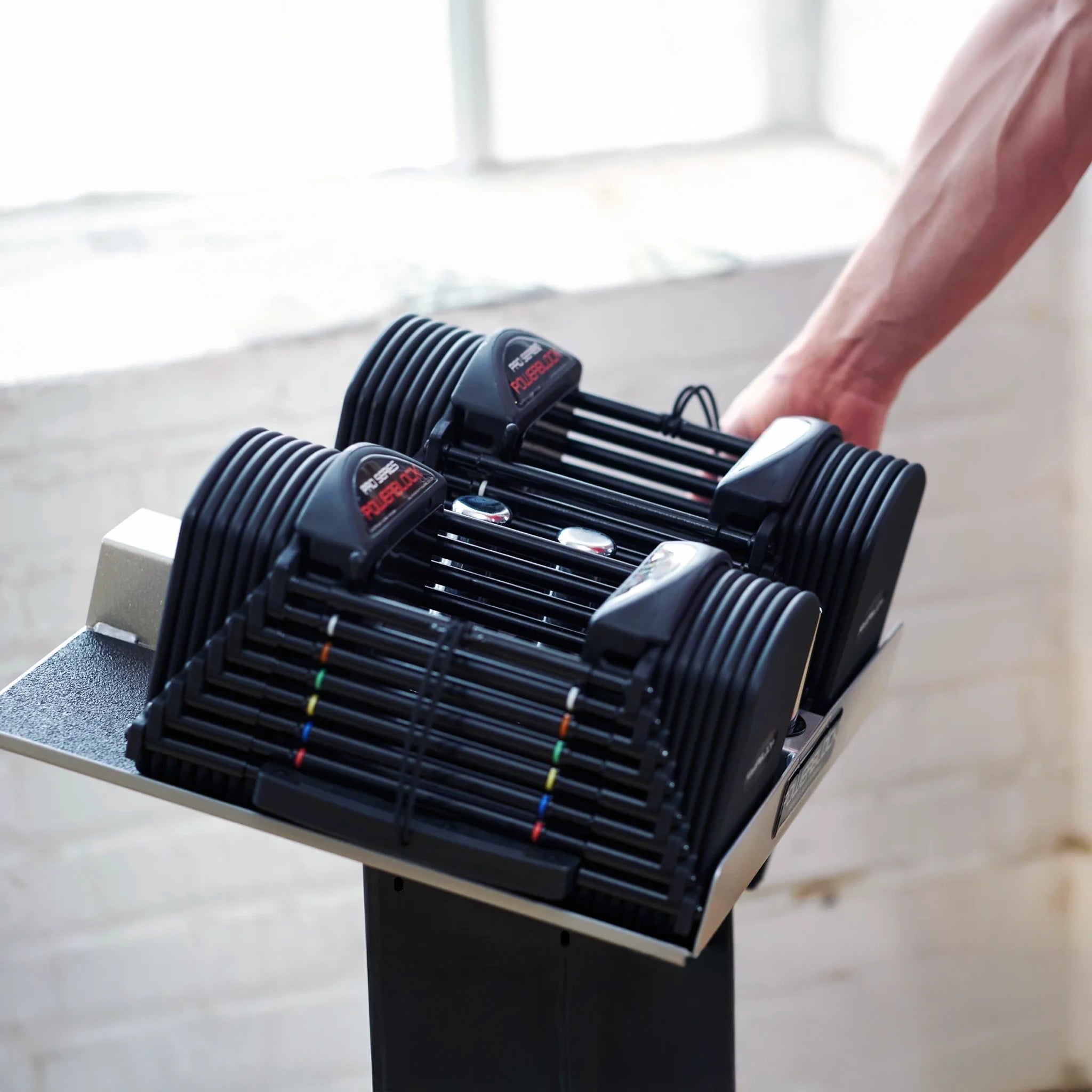 A pair of PowerBlock Pro 50 Dumbbells