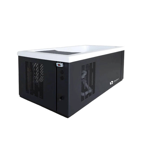 A rectangular cold plunge with a black exterior and white acrylic interior