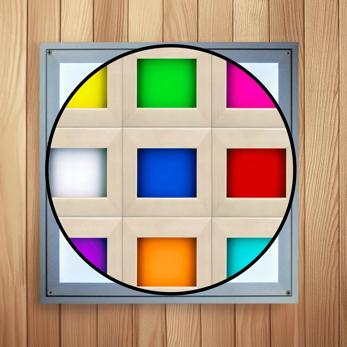 Overhead chromotherapy lighting cover from inside of a sauna with a cutout revealing the colors the light can display including yellow, green, pink, white, dark blue, red, light blue, orange, and purple