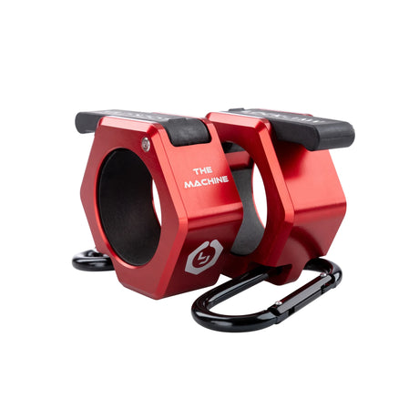 Red metal barbell collars by Lock-Jaw with the model name 'The Machine' written on the side in white letters