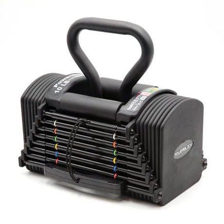 A PowerBlock Pro Kettlebell Handle sitting in a PowerBlock dumbbell