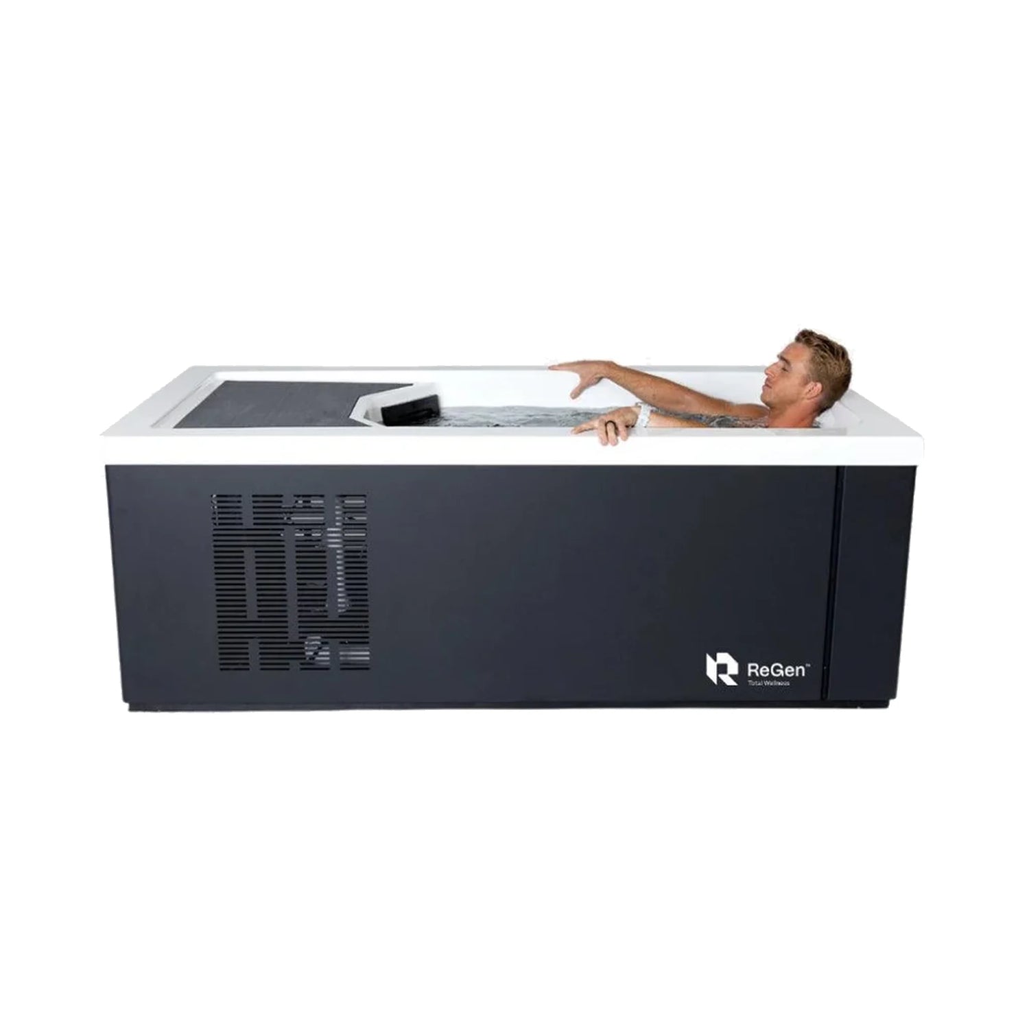 A rectangular cold plunge with a black exterior and white acrylic interior with a younger man inside the tub with his eyes closed