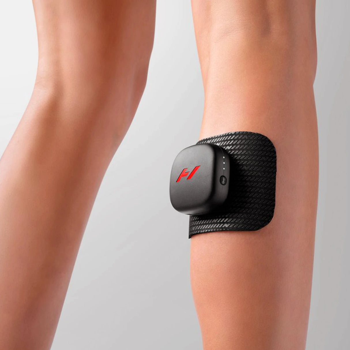 Heat and vibration therapy device which magnetizes to a pad which you stick to your body to help alleviate muscle soreness and speed up recovery
