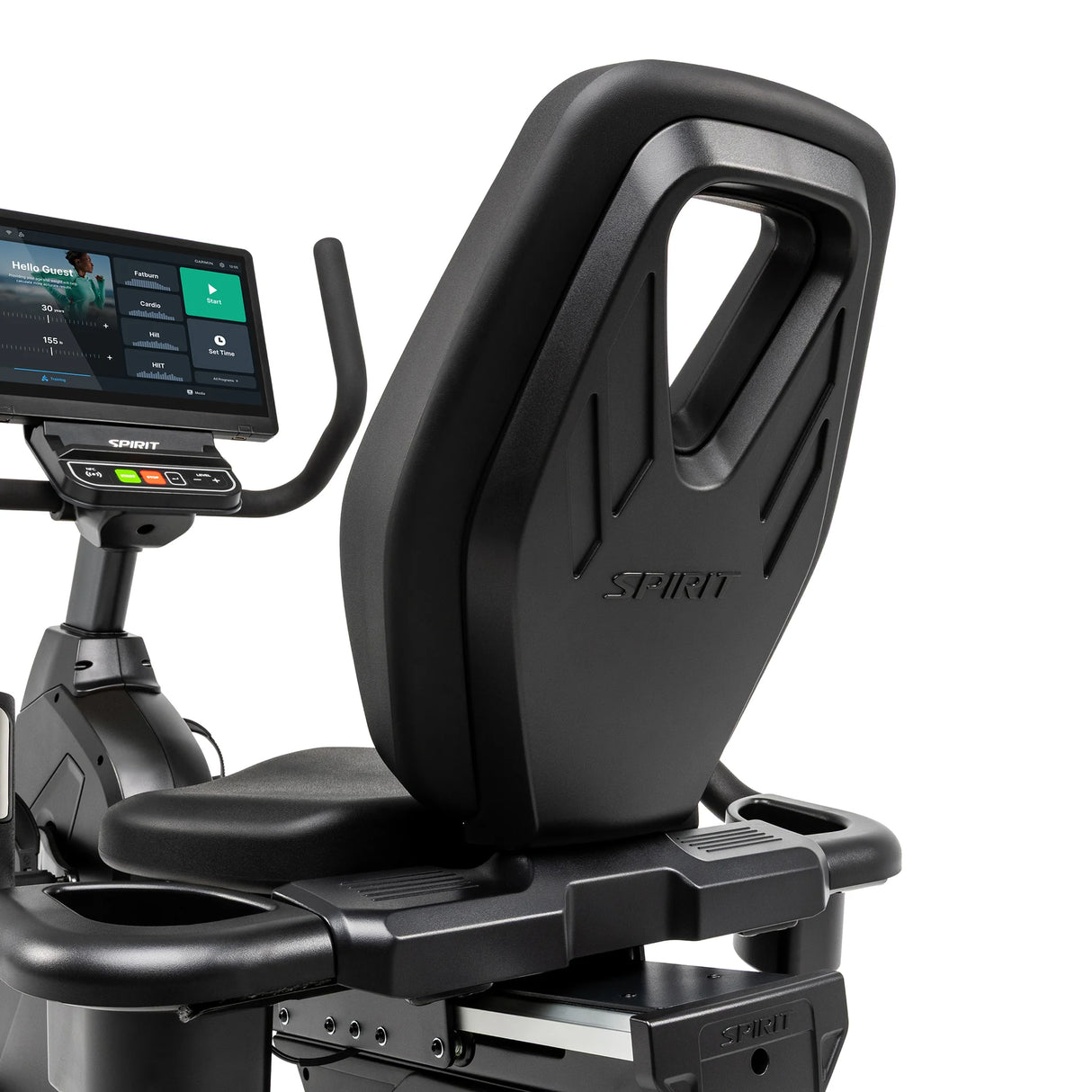 Angled close-up of the Spirit Fitness CR1000ENT Recumbent Bike's backrest showing the embossed Spirit logo and molded carry handle, with the touchscreen console visible in the background.