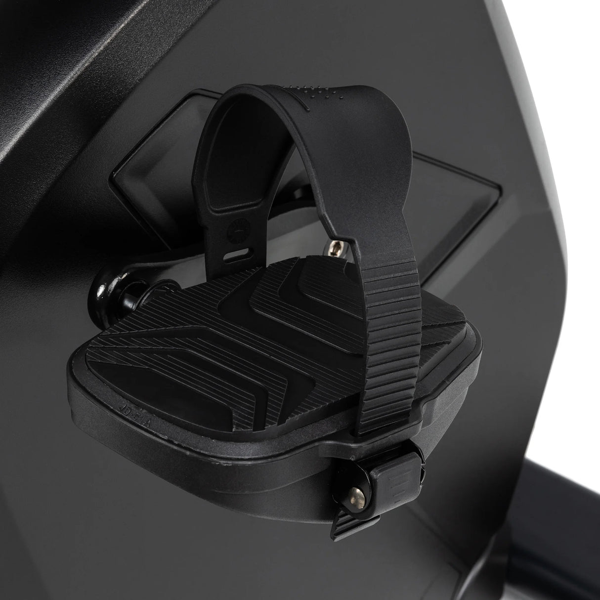 Close-up of a black pedal with adjustable textured strap on the Spirit Fitness CR900 Recumbent Bike by Spirit Fitness. The pedal features a non-slip rubber surface for secure grip while cycling.