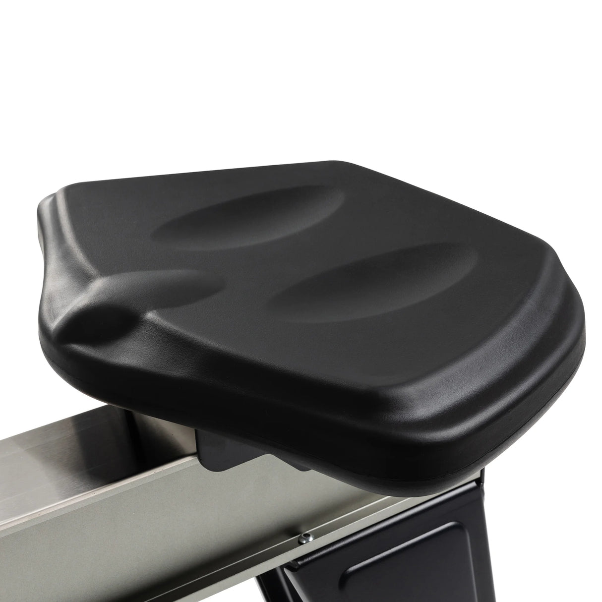 Close-up of the Spirit Fitness CRW800 Rower’s black contoured seat mounted on a metallic frame by Spirit Fitness, featuring ergonomic grooves and a sleek, modern design for comfortable rowing workouts.