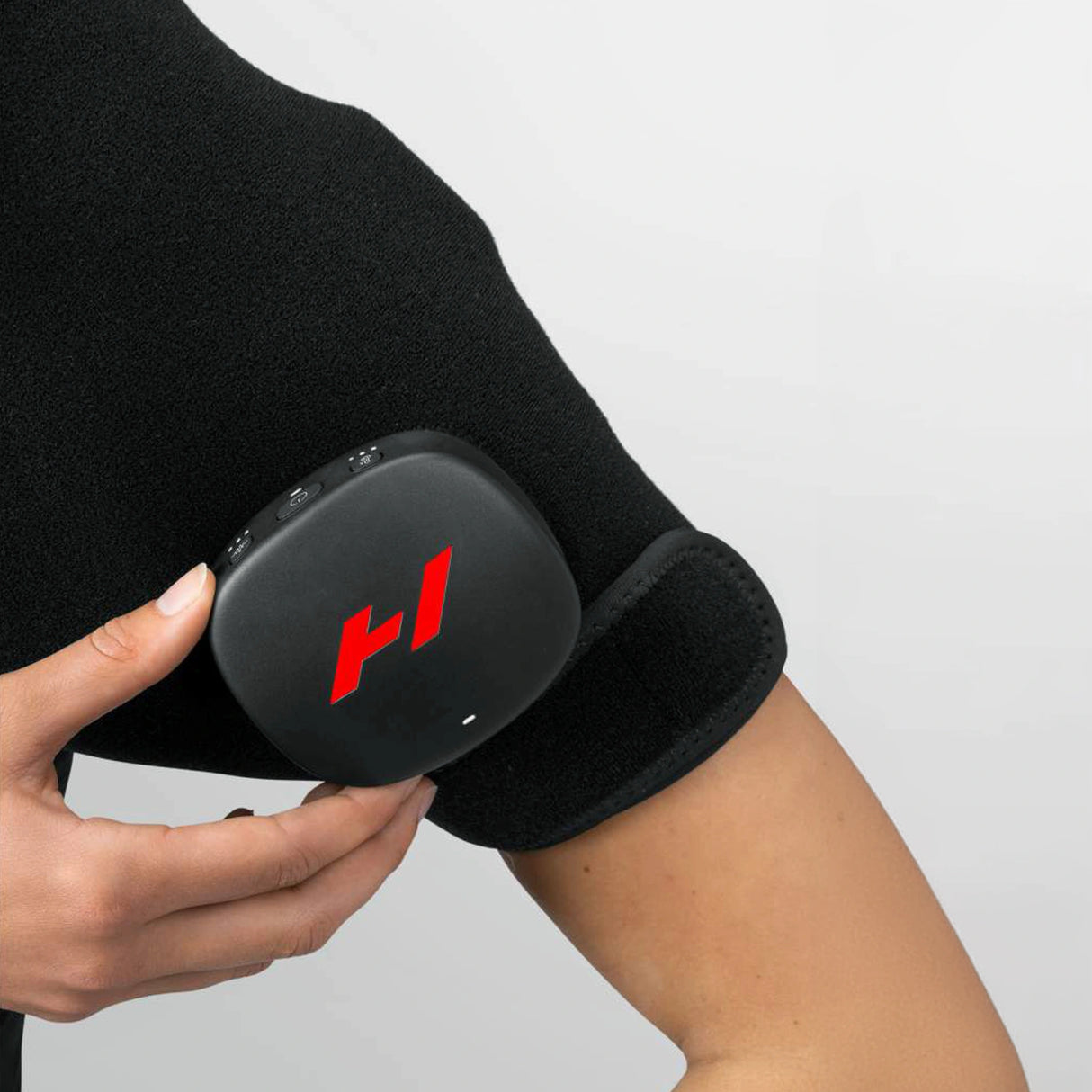 Pad which wraps around your shoulder to provide heat and vibration therapy to increase circulation and decrease pain