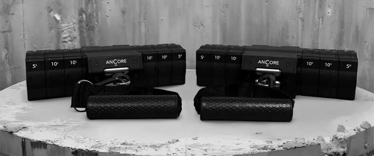 Two ANCORE portable cable units sitting side by side on a cement foundation