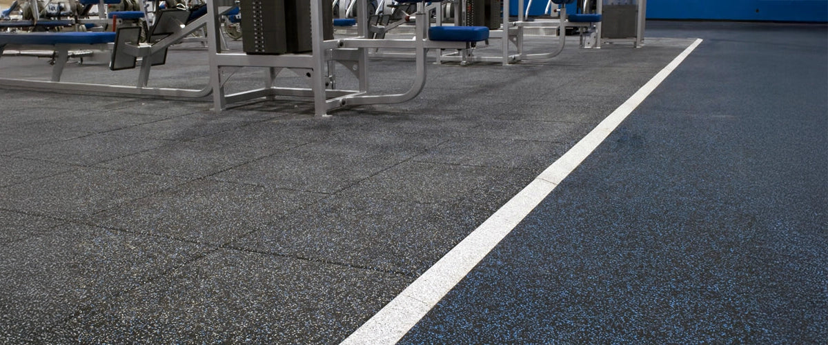ECORE UltraTiles next to ECORE Rally rolled rubber in a gym