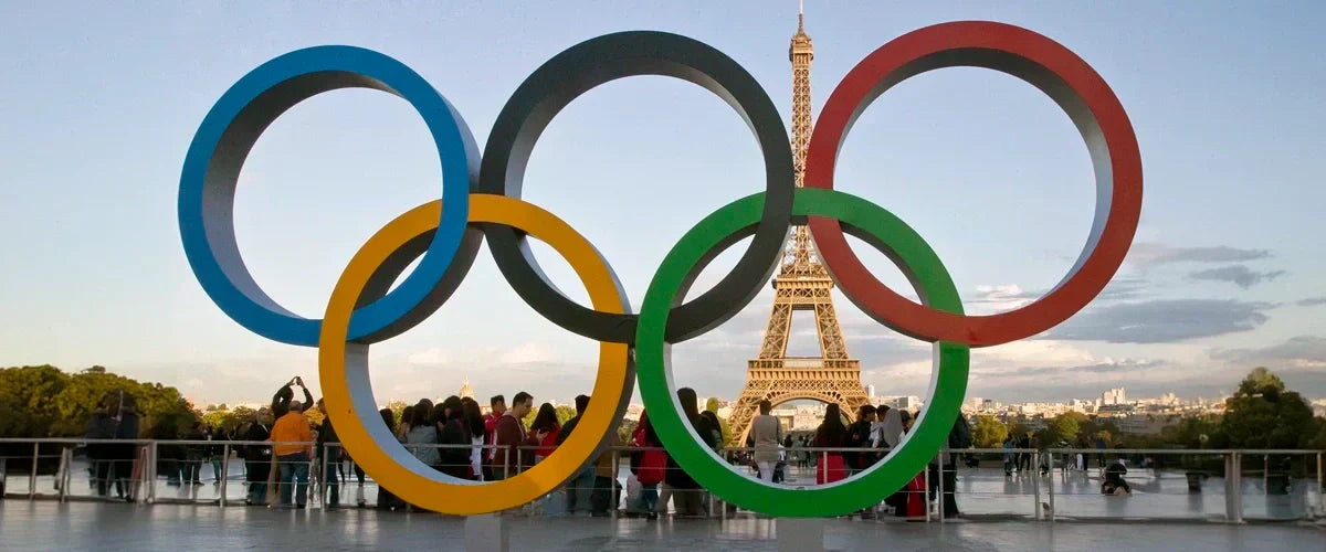 Paris Olympic rings taken in 2024 with Eiffel Tower in background