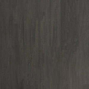 ECORE Athletic’s Balanced Motivate Laminate Roll - 7mm Class 1 Flooring features a dark gray, matte surface with subtle streaks and wood or stone-like texture, offering a natural, uniform look ideal for backgrounds or flooring.