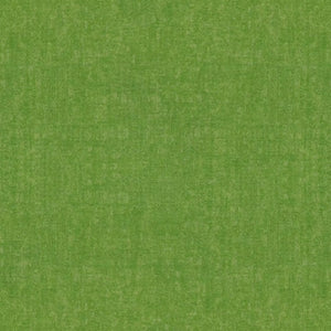 A close-up of ECORE Athletic's Baller Motivate Laminate Roll 7mm Class 1 Flooring shows its textured green surface, resembling a grassy field or soft fabric with a slightly mottled pattern.