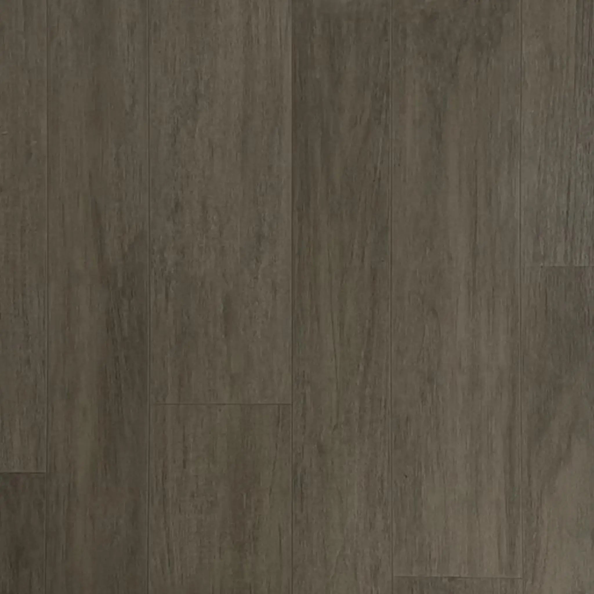 ECORE Balanced Motivate Laminate Roll - 7mm Class 1 Flooring by ECORE Athletic features dark brown, wood-look planks with a matte finish, subtle grain pattern, and smoothly installed surface for a natural, rustic style.