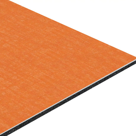 A close-up of the ECORE Baller Motivate Laminate Roll - 7mm Class 1 Flooring by ECORE Athletic shows its orange rectangular construction, layered edges, vibrant orange surface layer, and dark inner core.