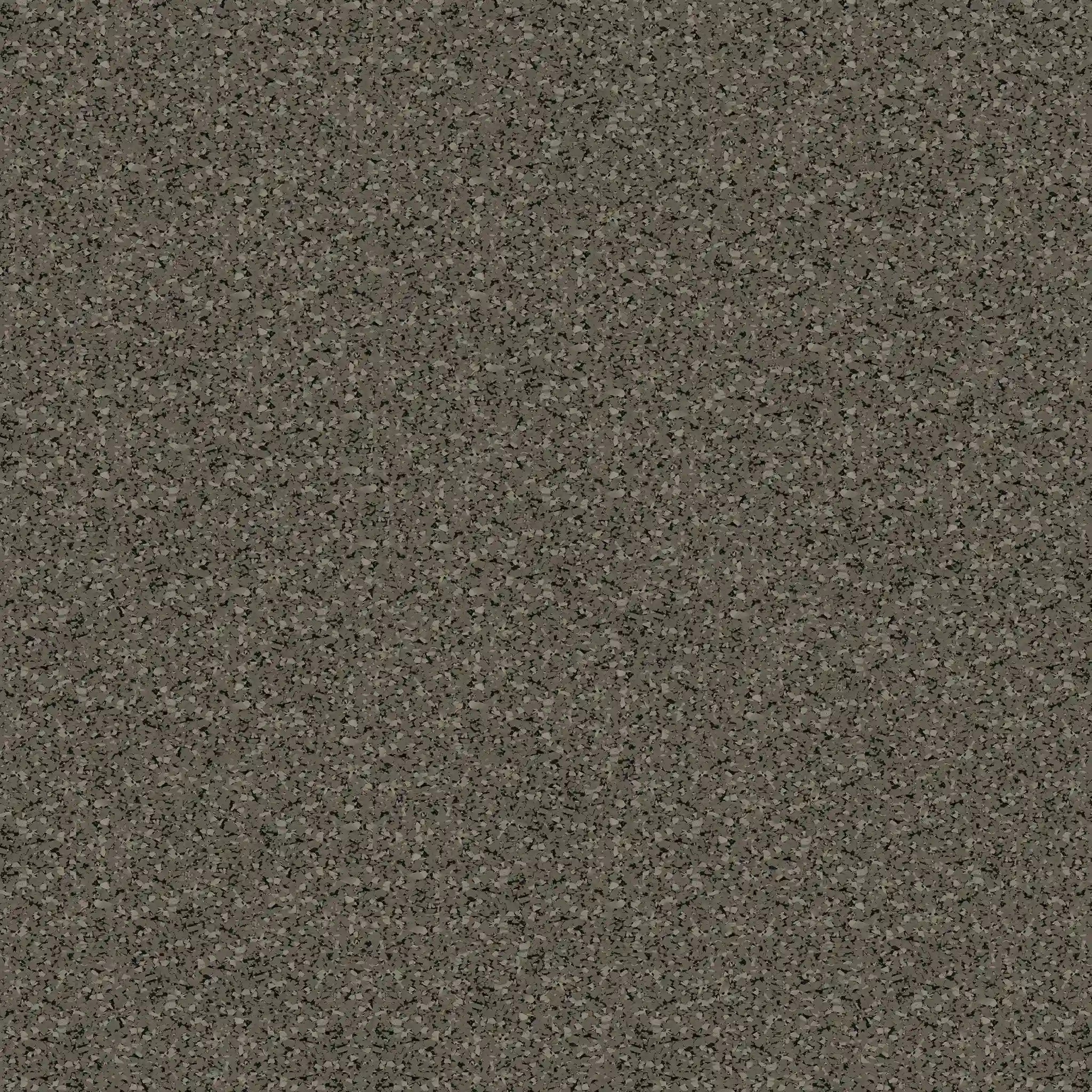 A close-up of the ECORE Performance Motivate Plus Rubber Roll - 10.5mm Flooring by ECORE Athletic shows a speckled brown and gray surface with textured, irregular dark and light spots.