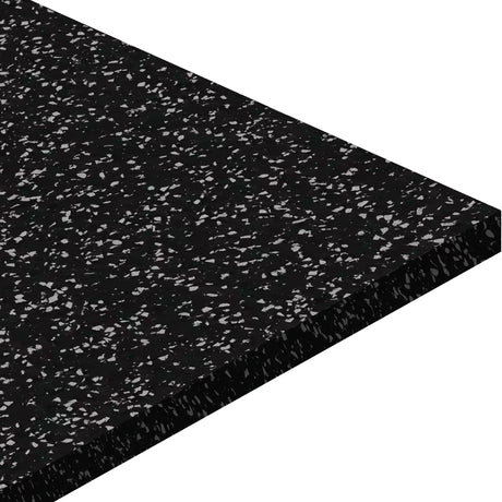 A close-up of ECORE Athletic's Basic Fit Rubber Roll - 8mm Flooring in black with white speckles, shown from an angle to highlight its thickness and textured surface.