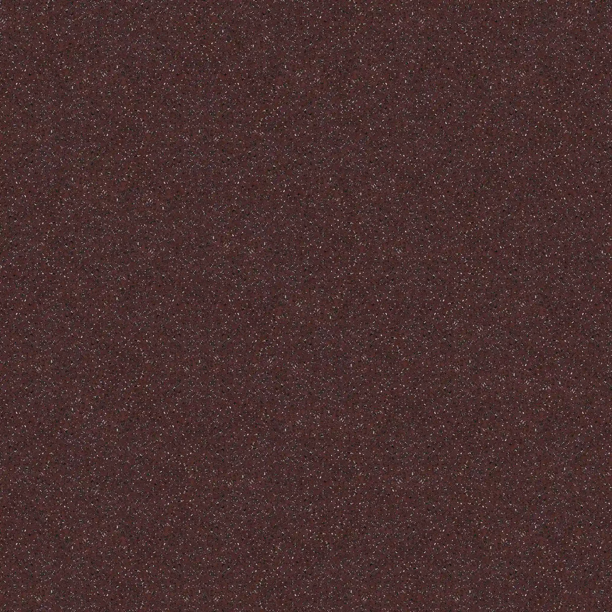 A close-up of ECORE Athletic's ECORE Performance Beast Rubber Roll - 10.5mm Flooring shows a dark, rough textured surface with a reddish-brown base and tiny multicolored speckles, resembling coarse sandpaper.